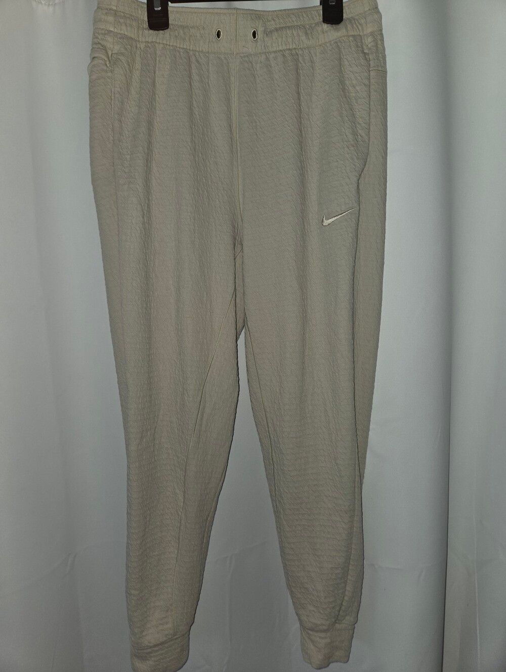 Nike Dri-Fit Beige Track Joggers with White Swoosh